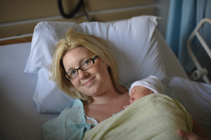 Mother in Hospital Bed With Newborn