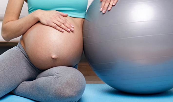 Pregnant Woman With Birth Ball