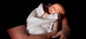 Newborn In dad's arms