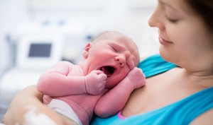 Woman holding newborn