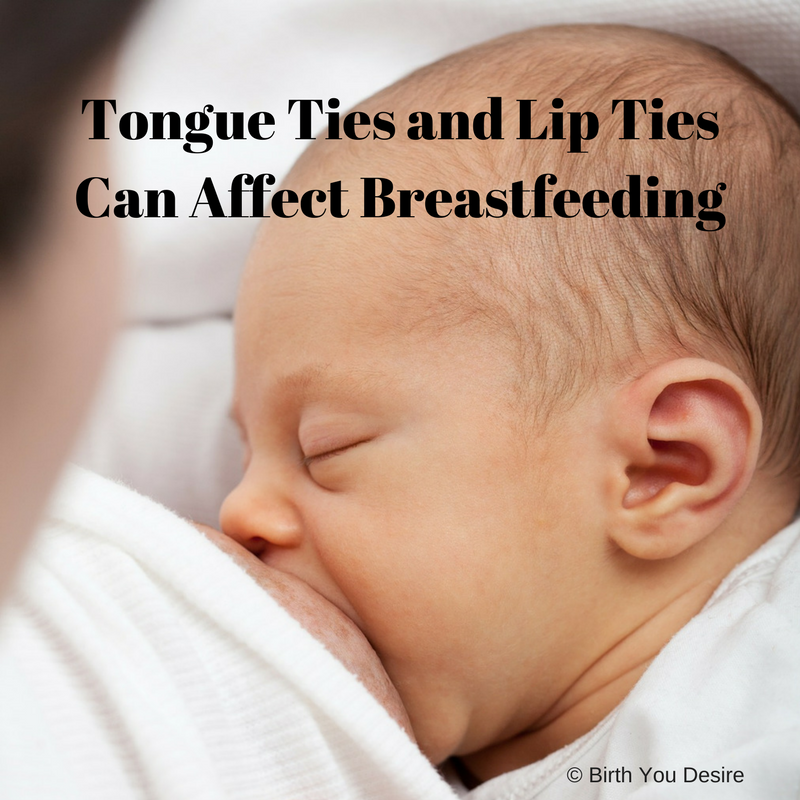 baby at breast feeding