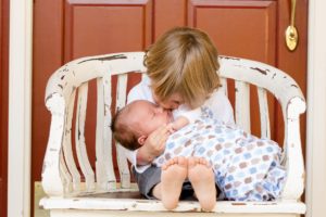 brothers kissing