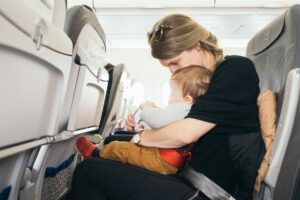 mother and baby on airplane