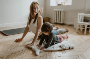 Mom & toddler doing yoga