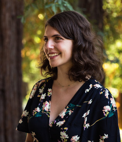 Brunette woman in a flora shirt 