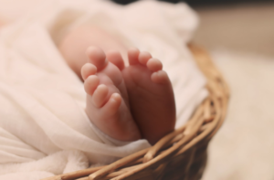 baby toes in a basket 