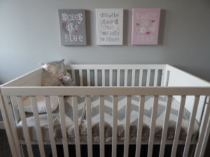 crib with grey and white sleep theme