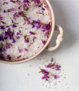 white bowl filled with salt and herbs